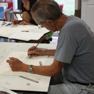 Man in Adult Drawing Class drafting picture