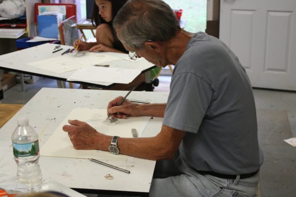 Man in Adult Drawing Class drafting picture