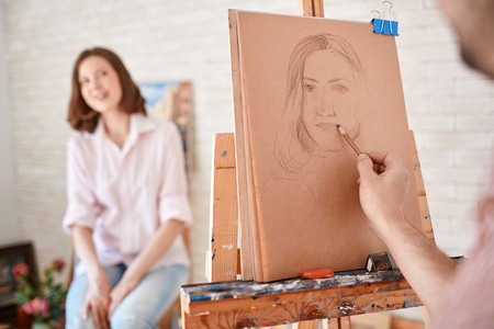 Man Drawing a Portrait in Class
